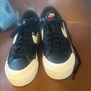 Nike Women's Black and White Low-Top Sneakers